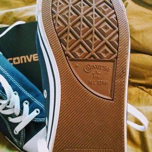 *Navy Converse sneakers*